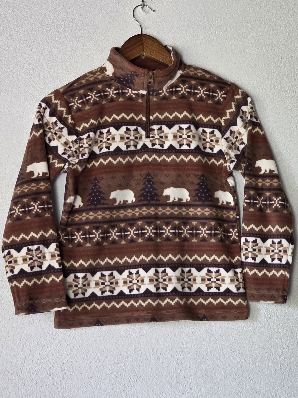 Warm and cozy The Children’s Place fleece quarter-zip pullover sweater.